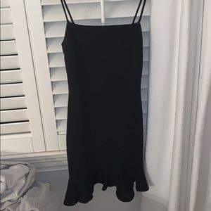 Black Mini Dress with Peplum at the bottom